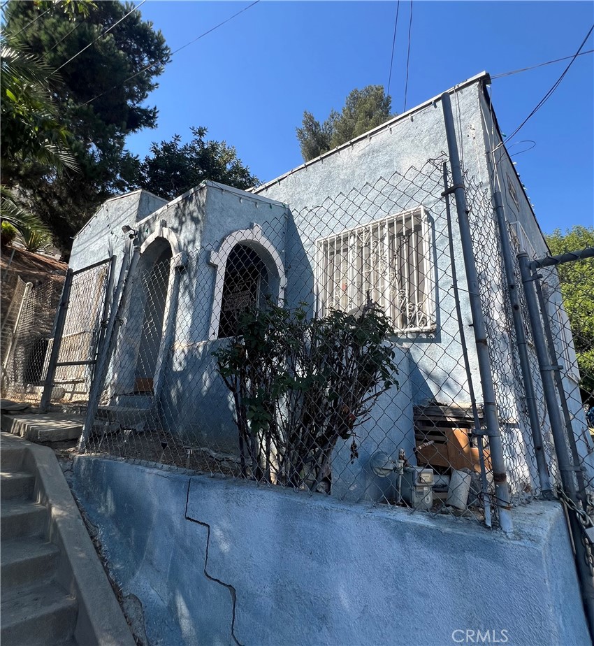 a view of a garage with stairs