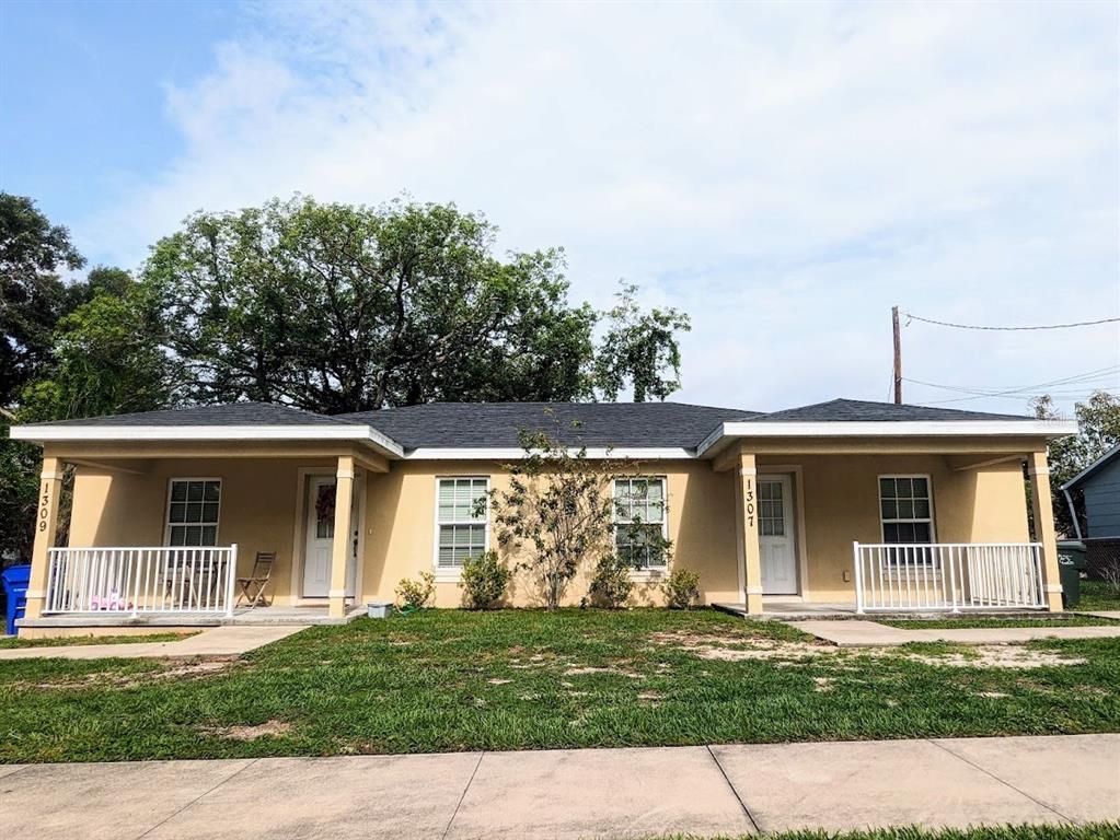 front view of a house and a yard