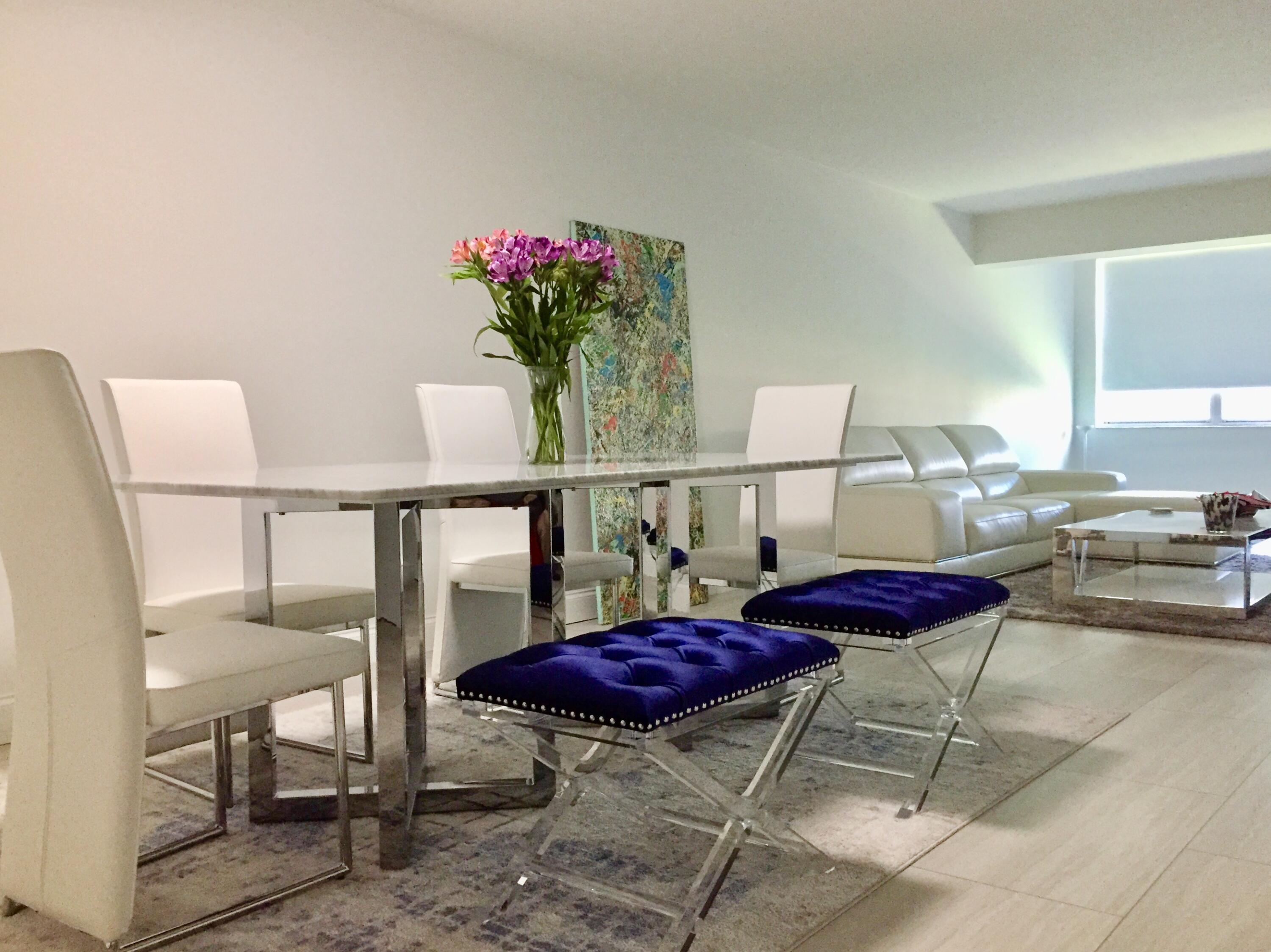 a view of a dining room with furniture