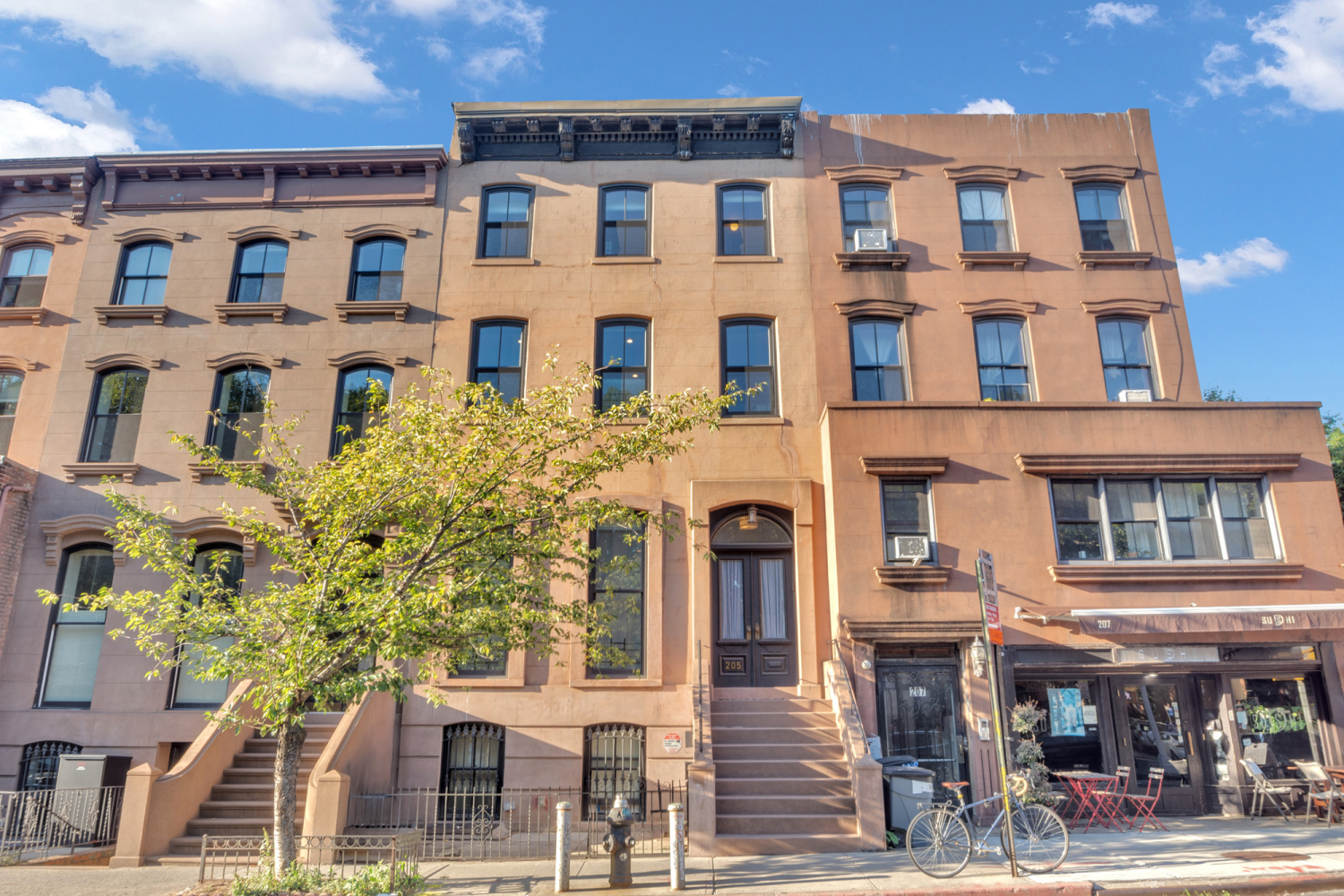 a front view of a multi story residential apartment building