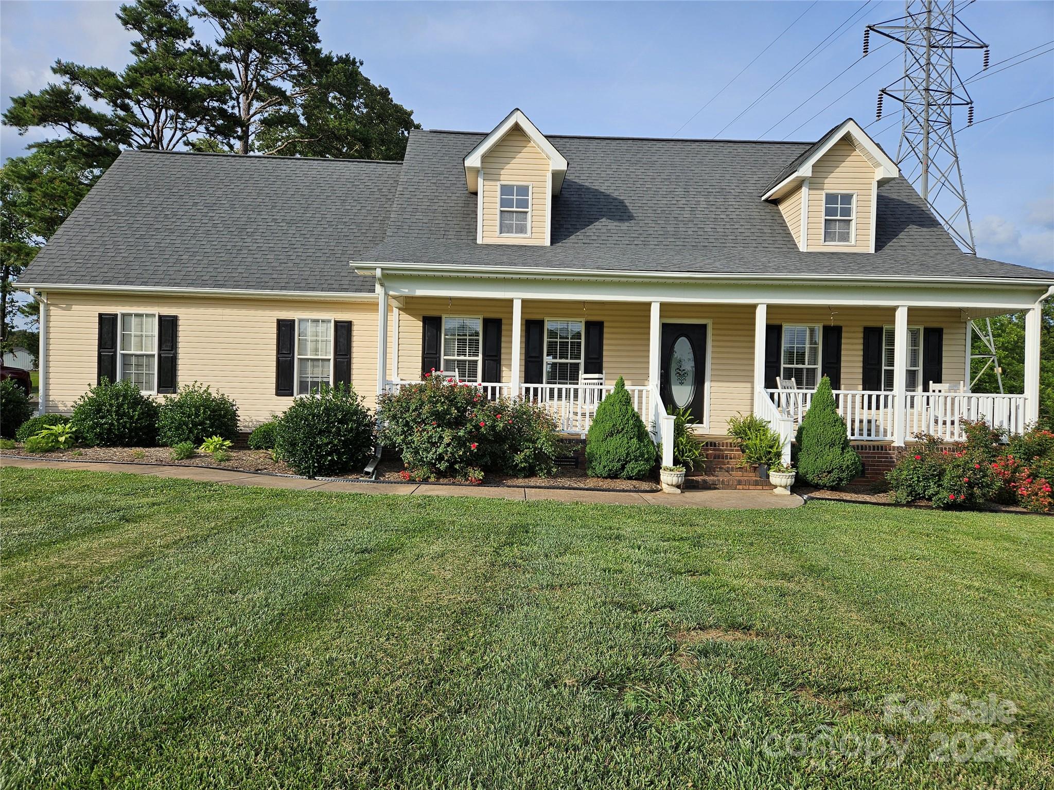 front view of a house with a yard