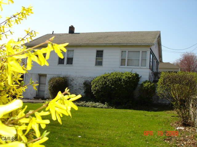 a front view of a house with swimming pool