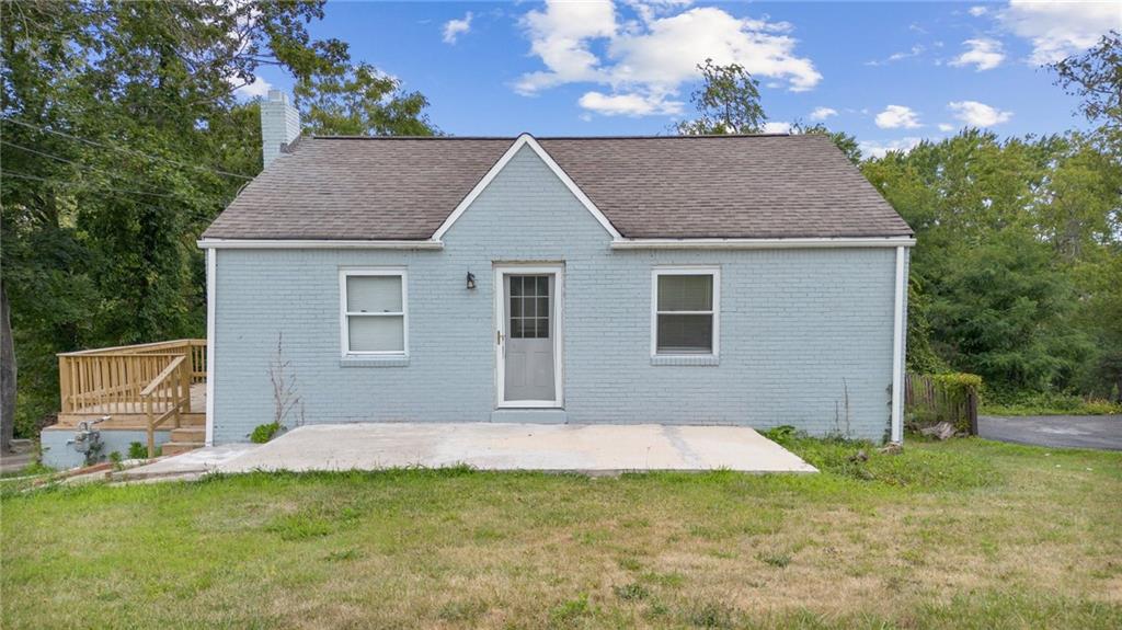 a house with a yard in front of it