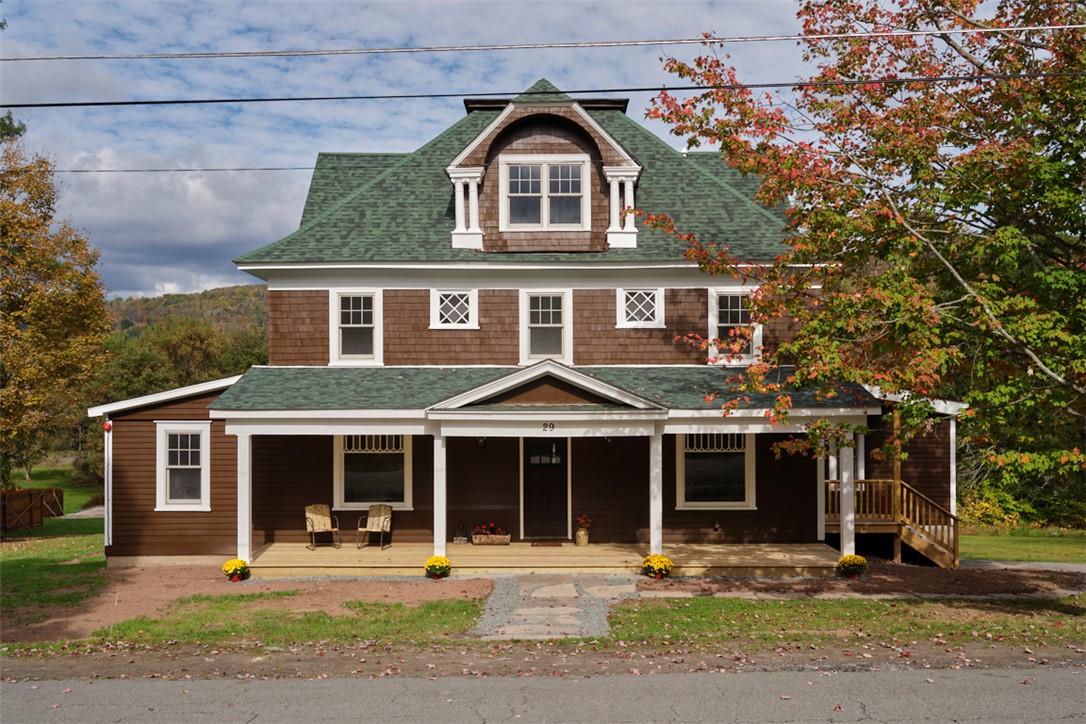 View of front of home with covered porch