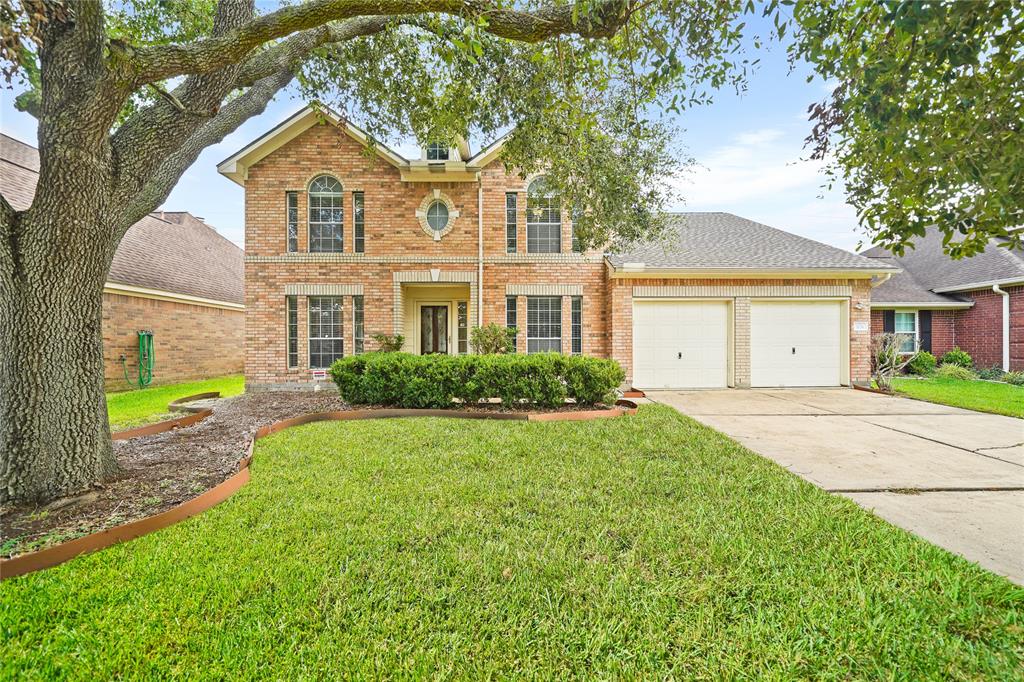 Beautiful two-story home in quiet neighborhood. The oak tree offers wonderful shade and oversized flower bed is ready for whatever inspiration the new owner has!