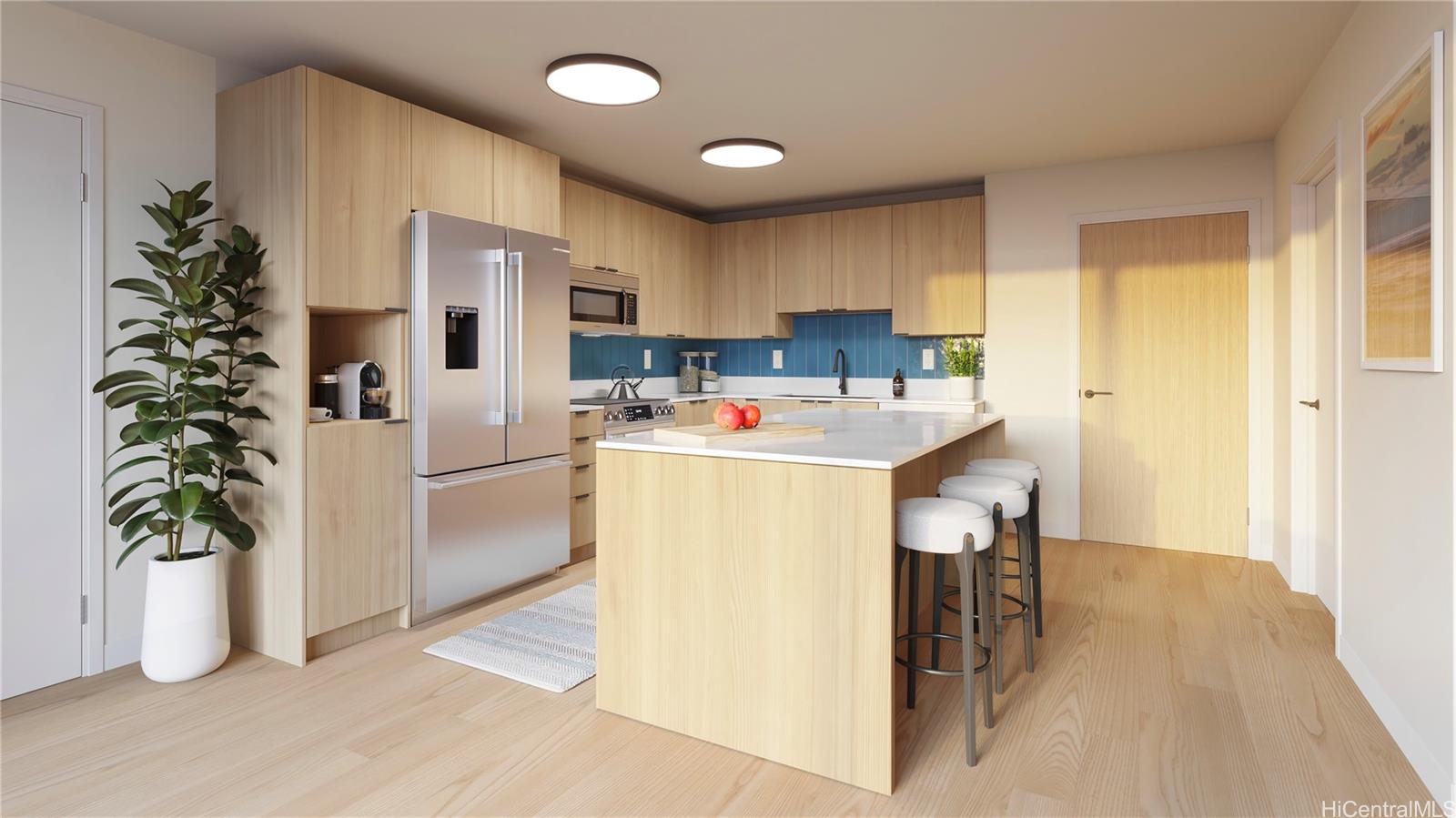 a utility room with cabinets washer and dryer