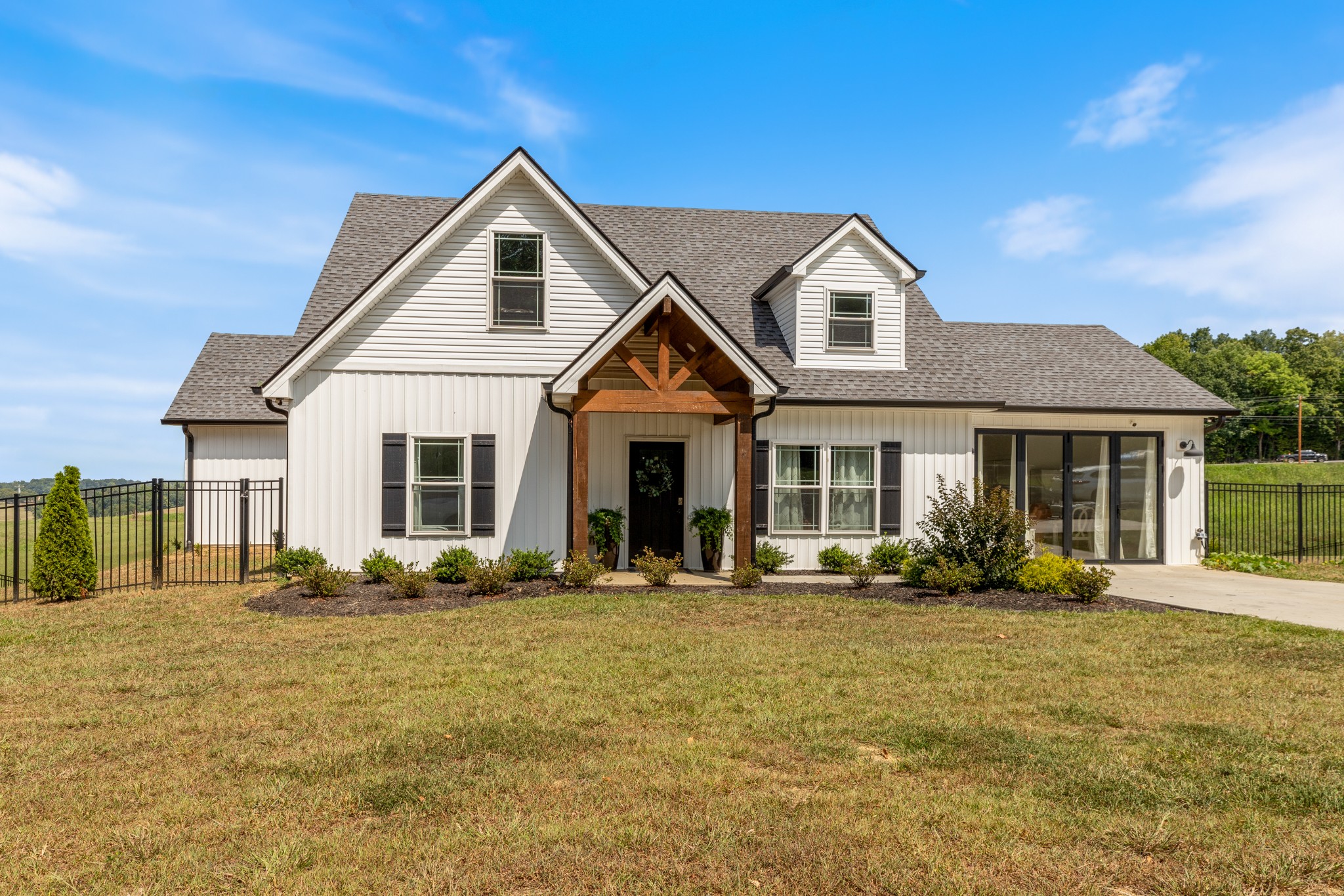 a front view of a house with yard