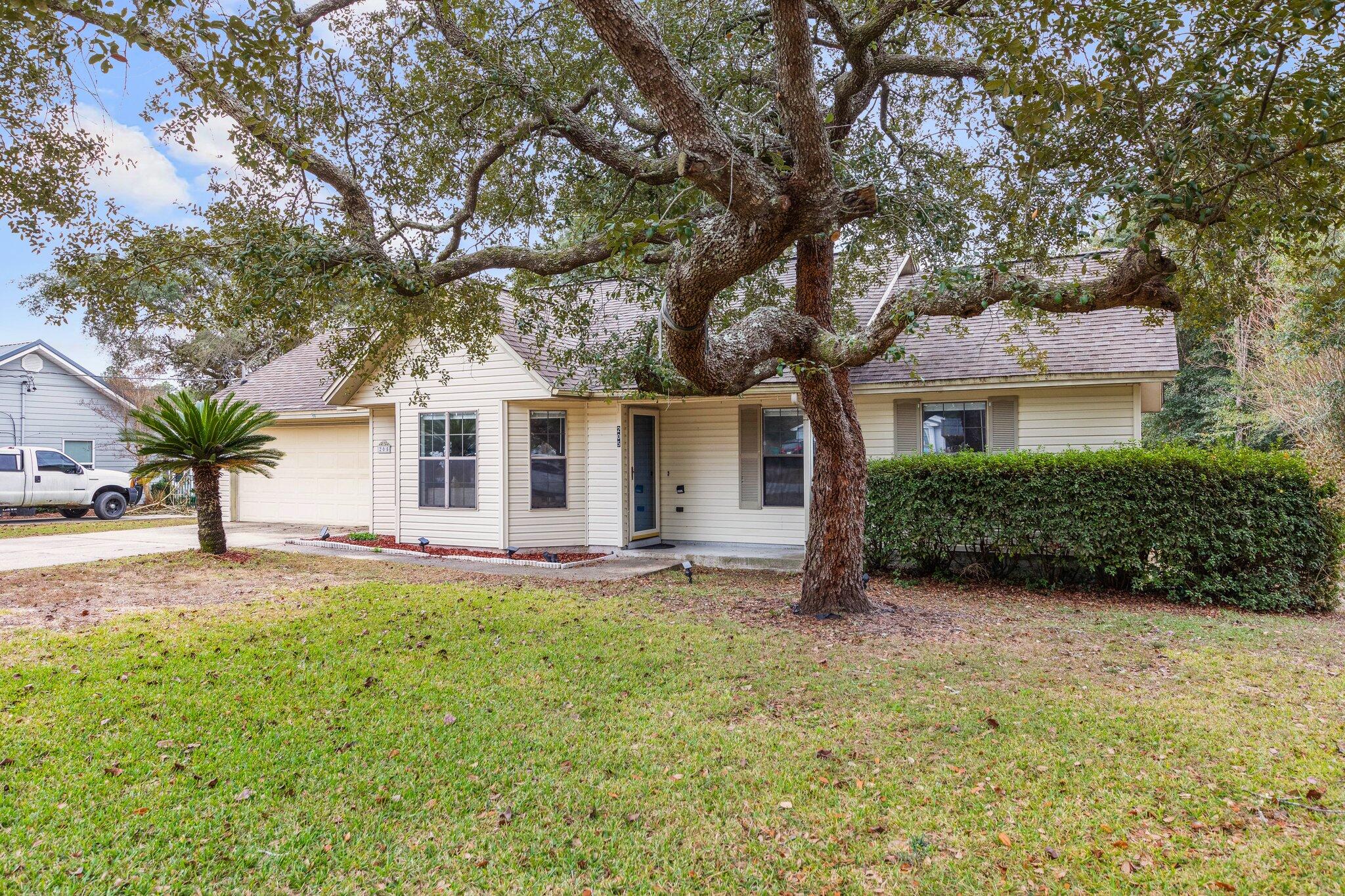 front view of a house with a big yard