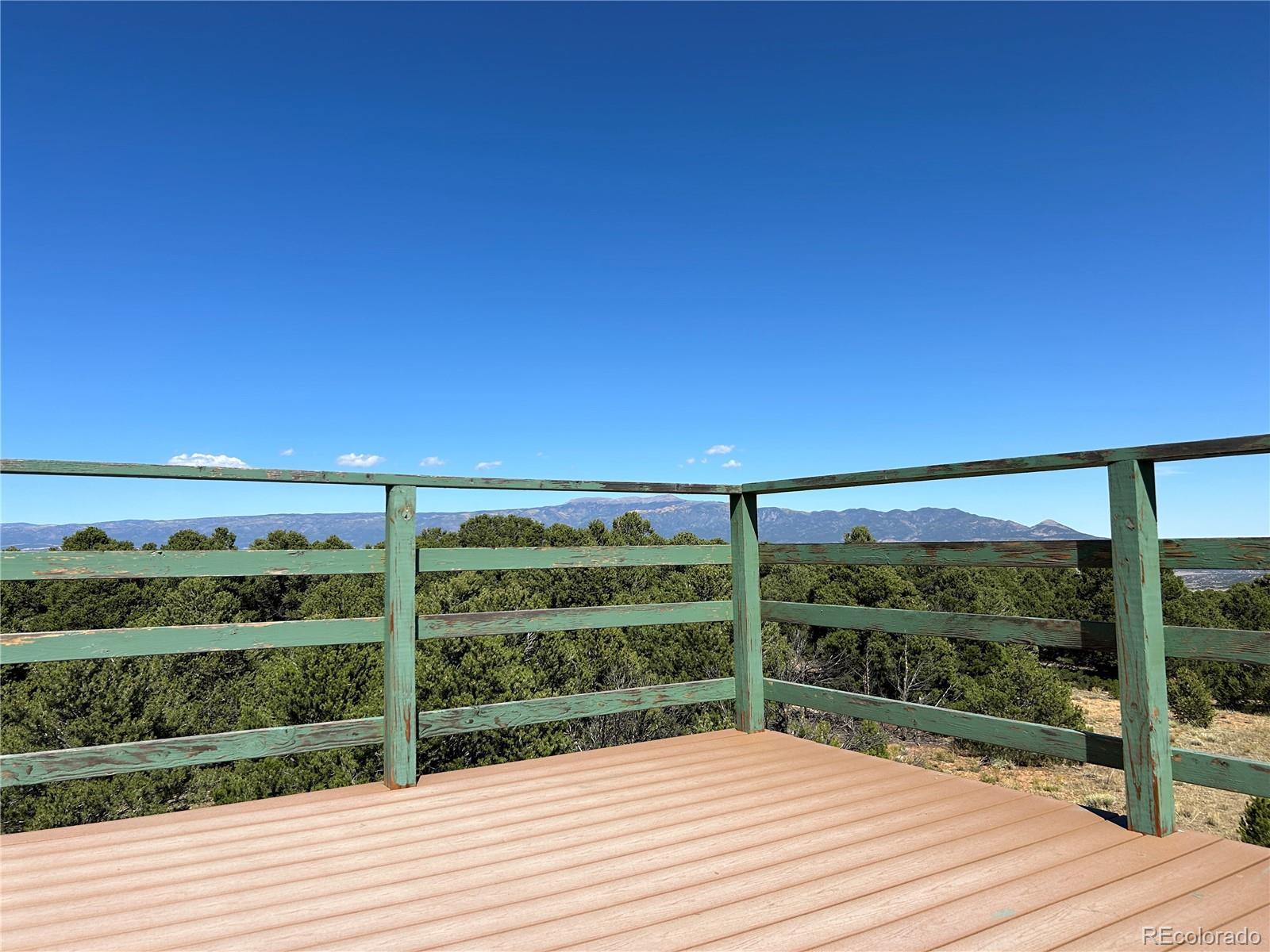 a view of a balcony with an outdoor space