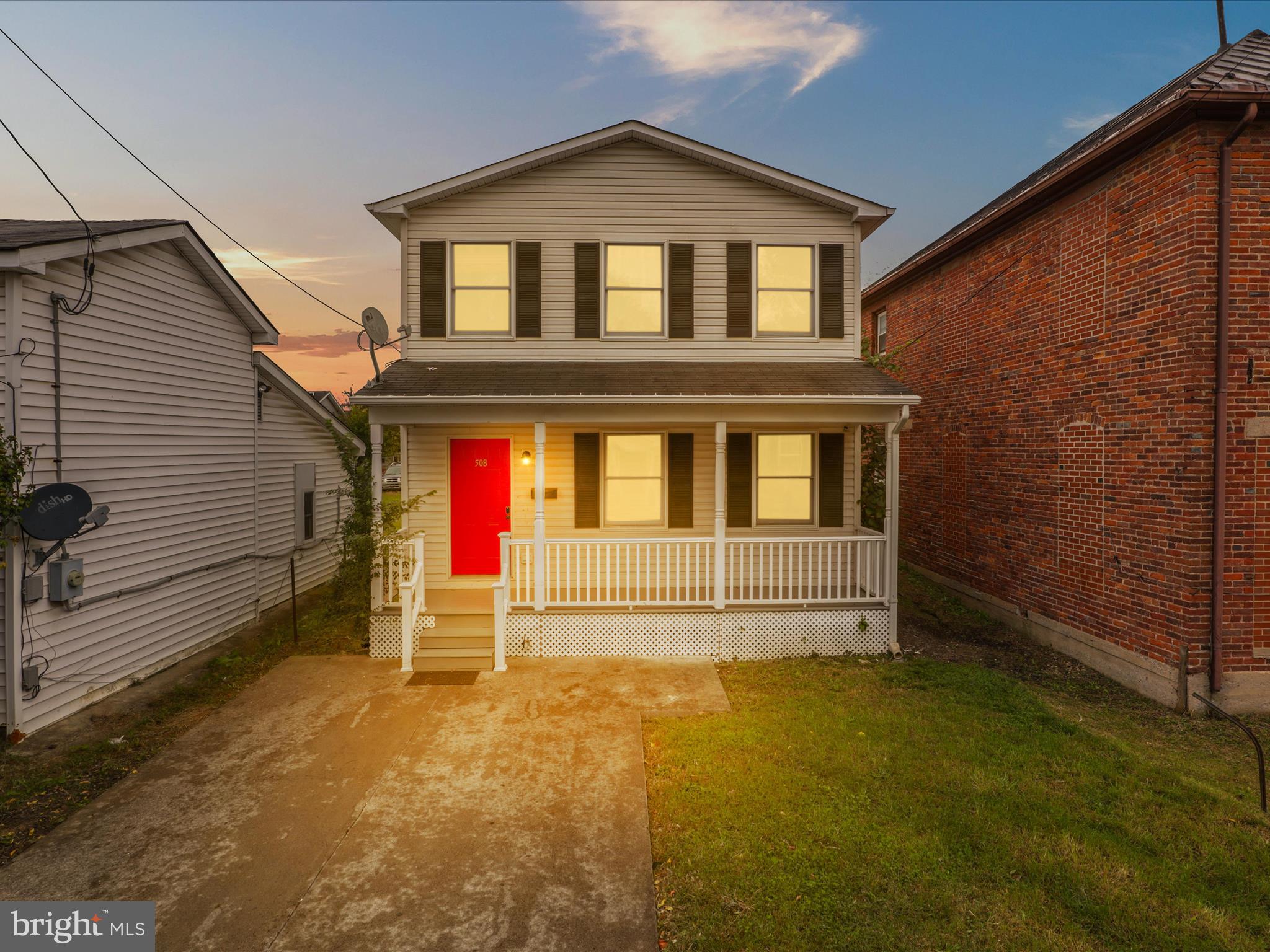 a front view of a house with a garage