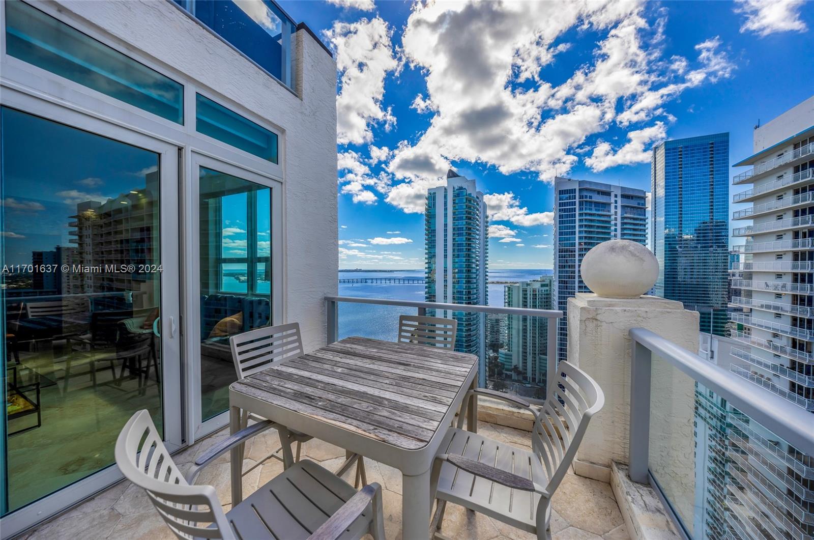 a outdoor dining space with furniture