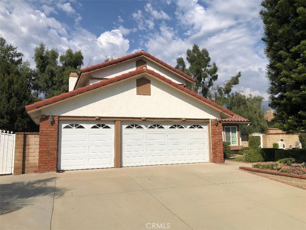 a front view of a house with a garage