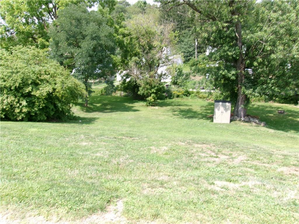 a fire hydrant in the middle of a field