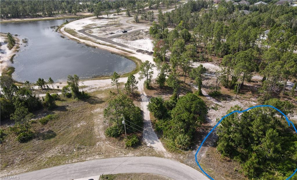 Aerial View featuring lot and nearby lake