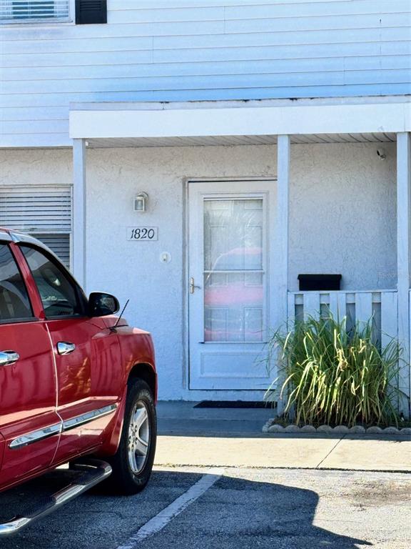 a car parked in front of a house