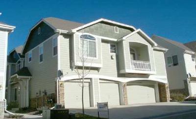 a front view of a house with a garage