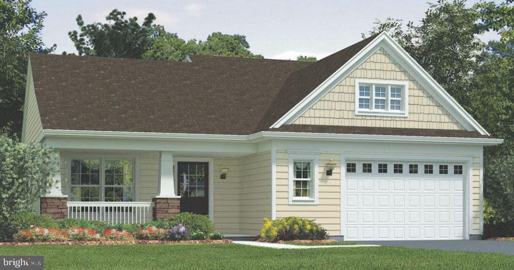 front view of a house and a yard