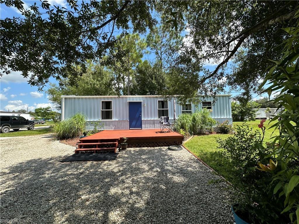 front view of a house with a patio