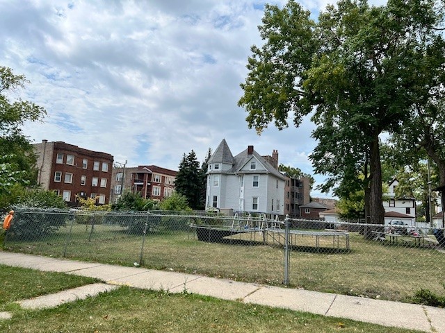 a view of a house with a big yard