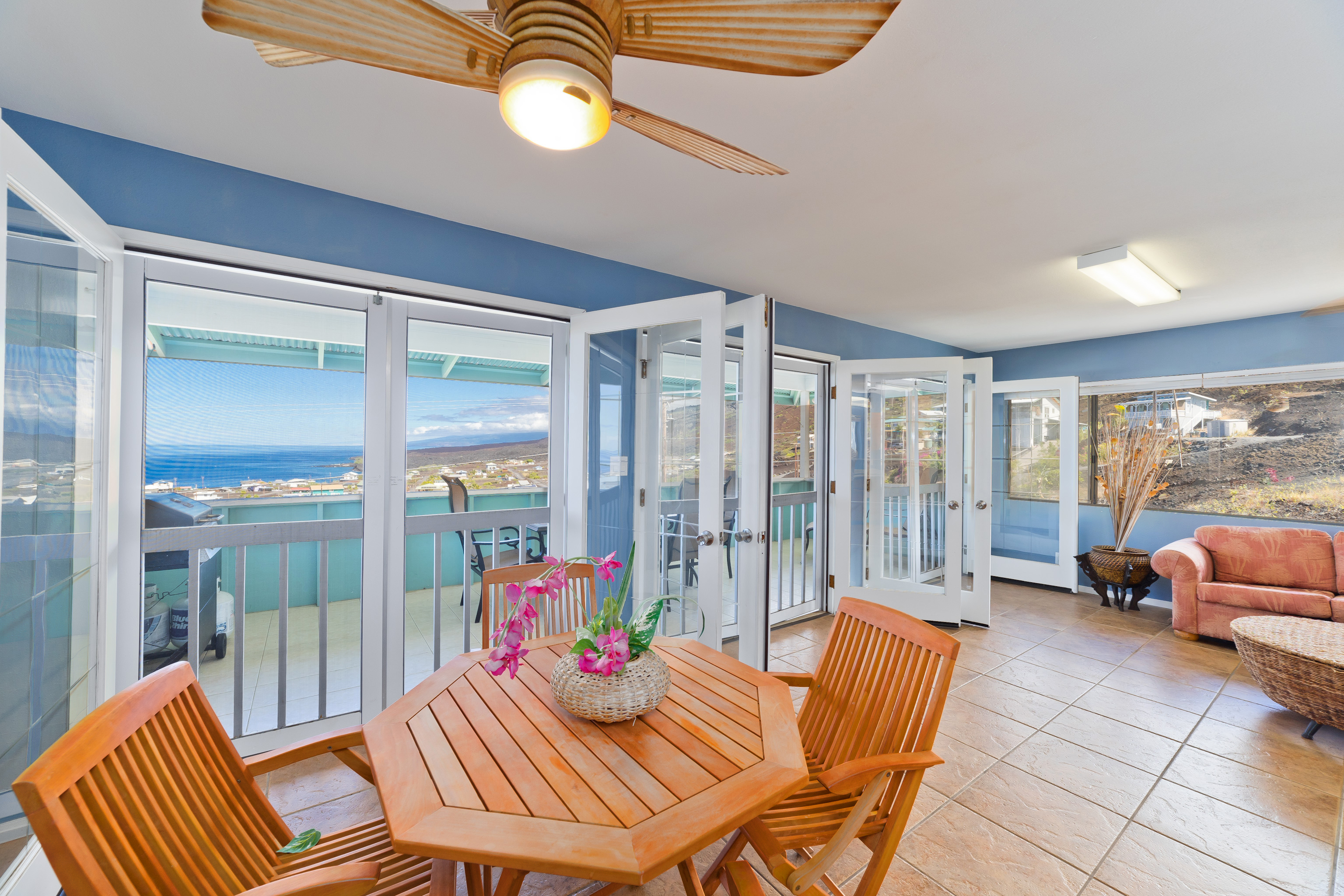 a outdoor space with patio the couches and a dining table with garden view