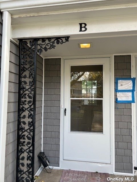 a front view of a house with a shower