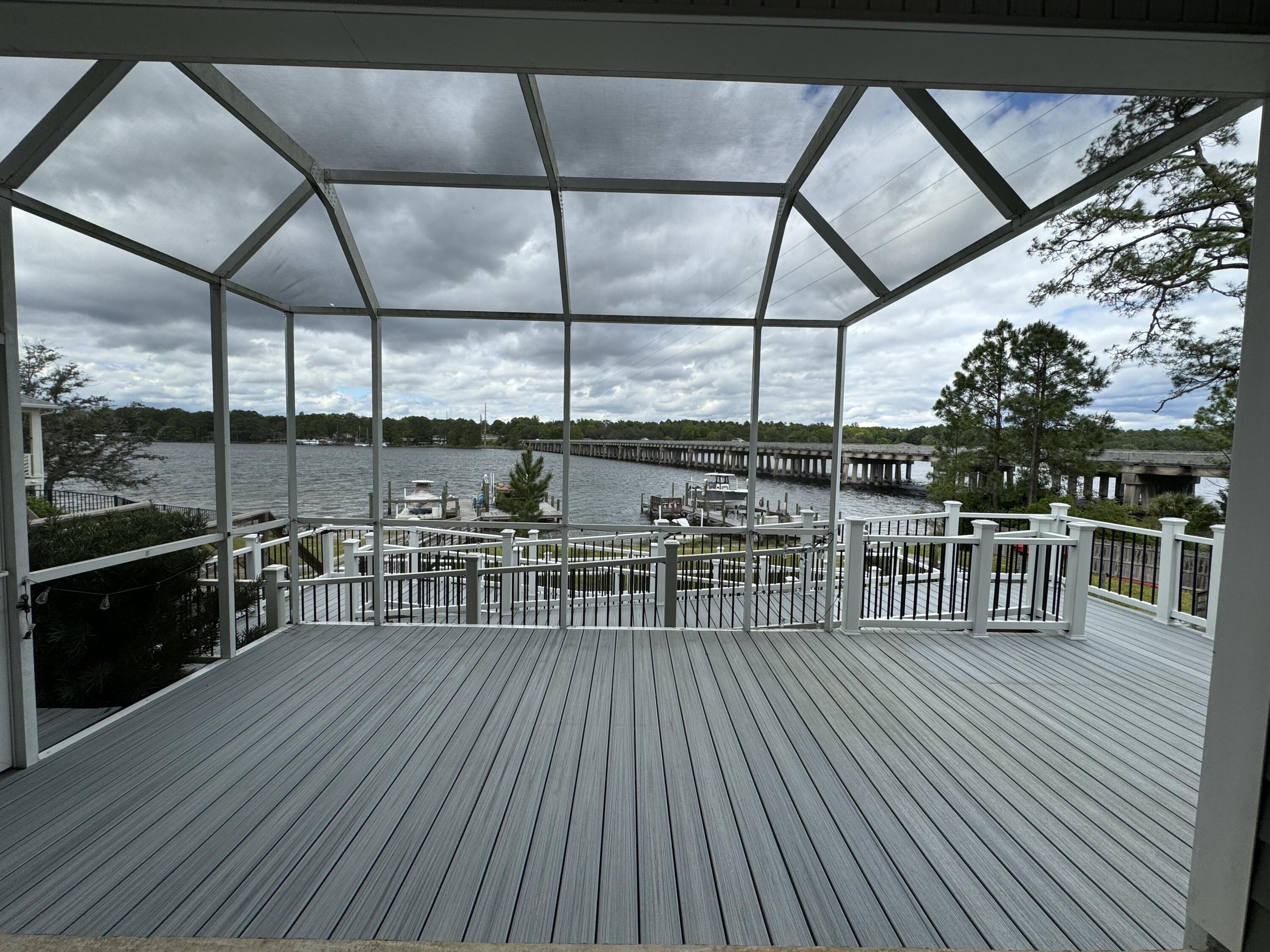 a view of balcony with furniture