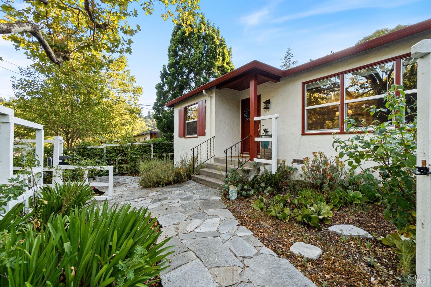 a backyard of a house with lots of green space