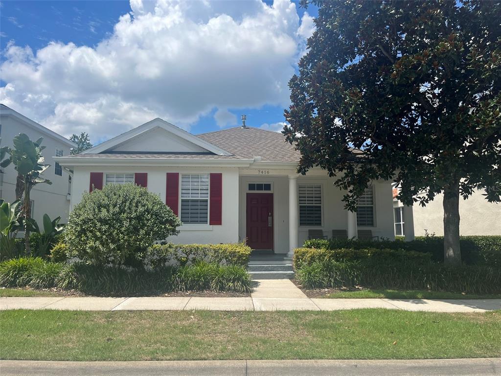 front view of a house with a yard