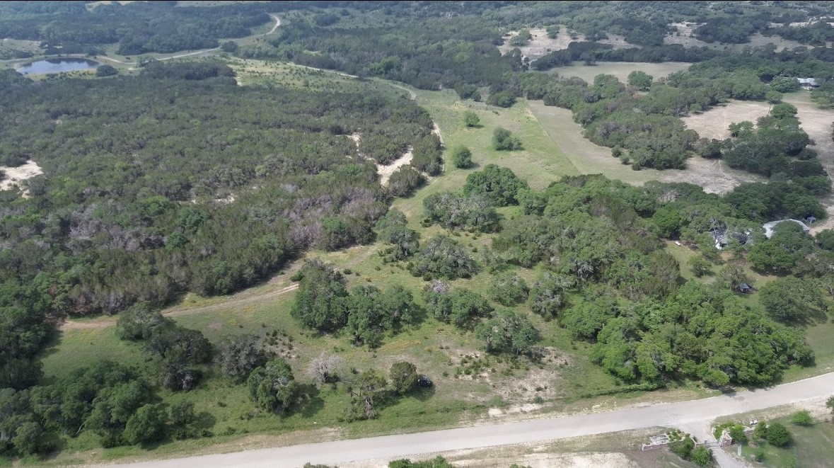 an aerial view of residential house with outdoor space