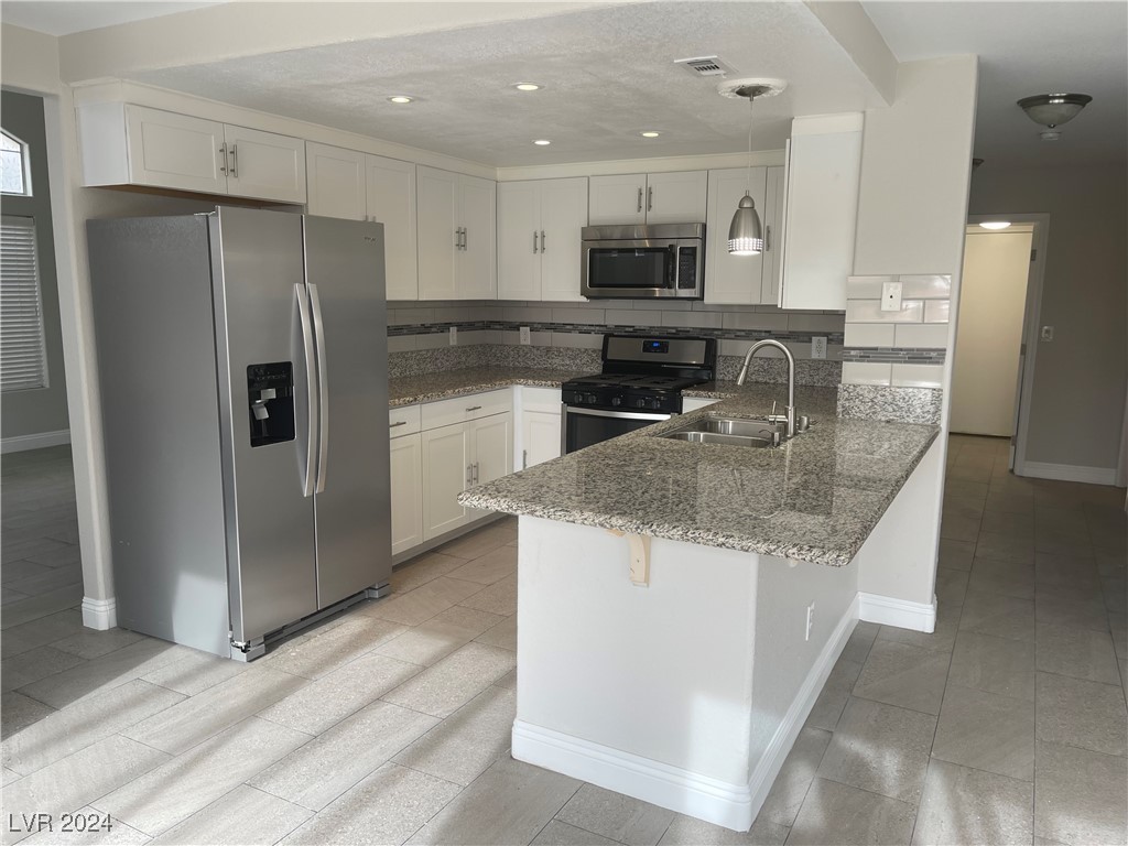 Newly updated featuring granite counter tops, stai