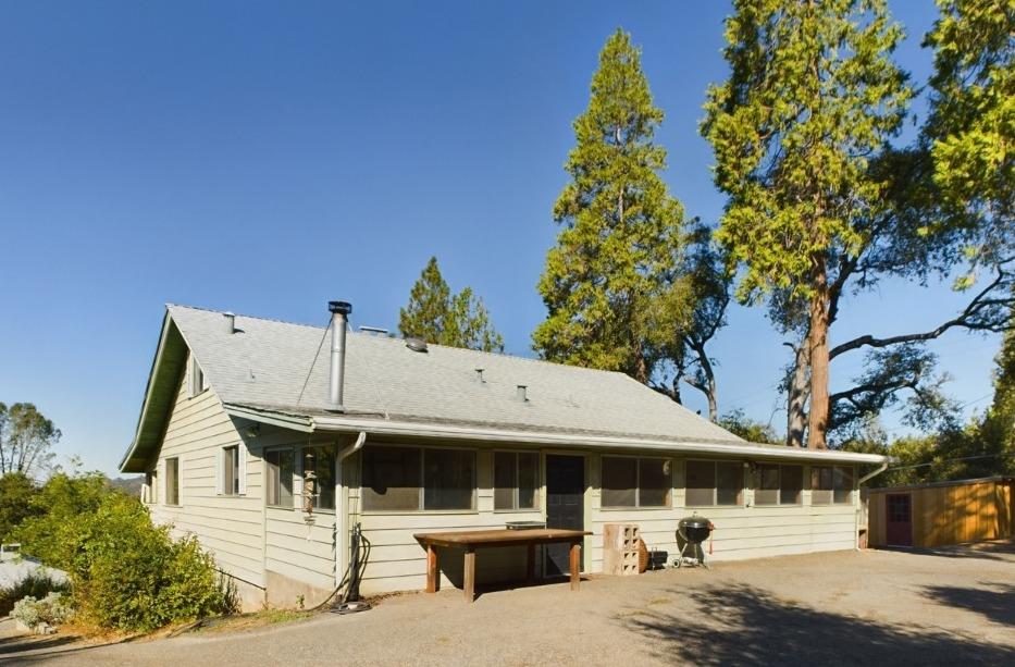 a front view of a building with garden