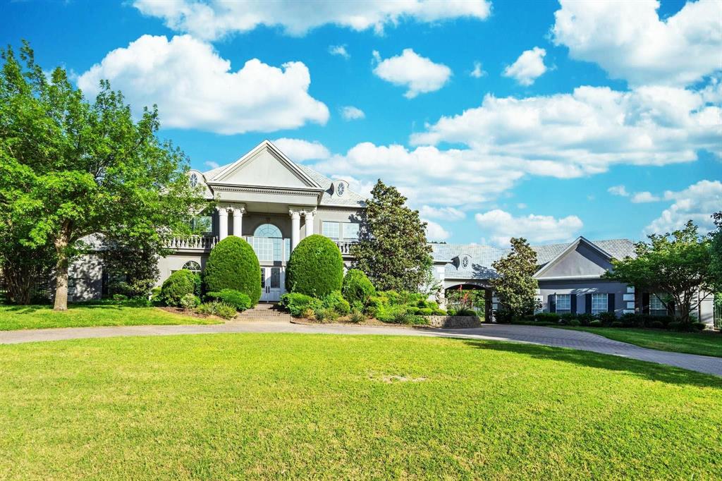 a front view of house with yard