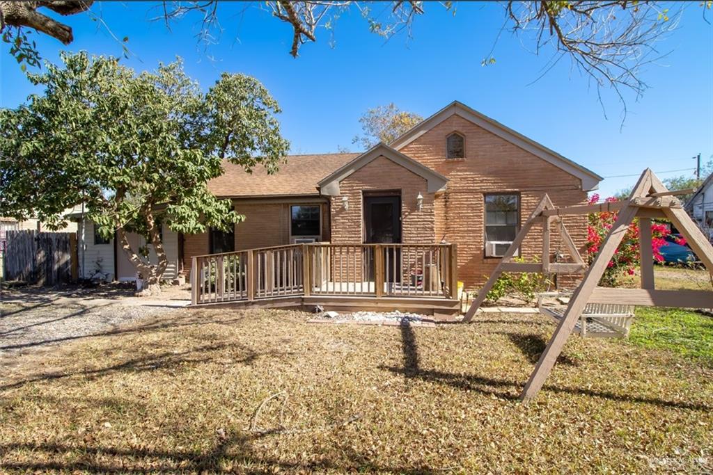 View of front of property with a front yard