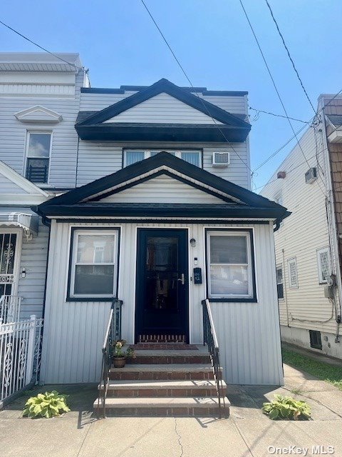 a front view of a house with entryway