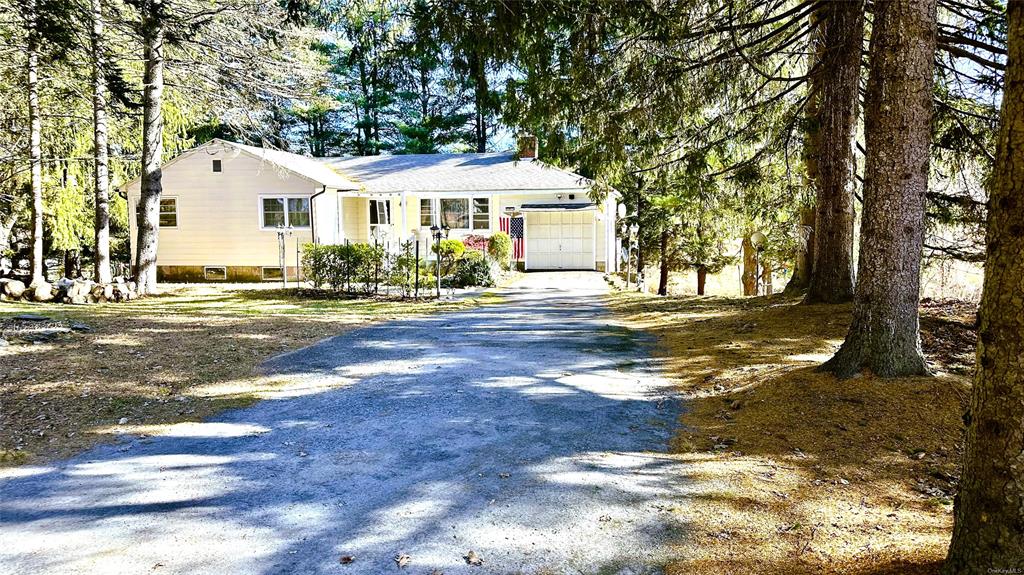 View of front of home with a garage