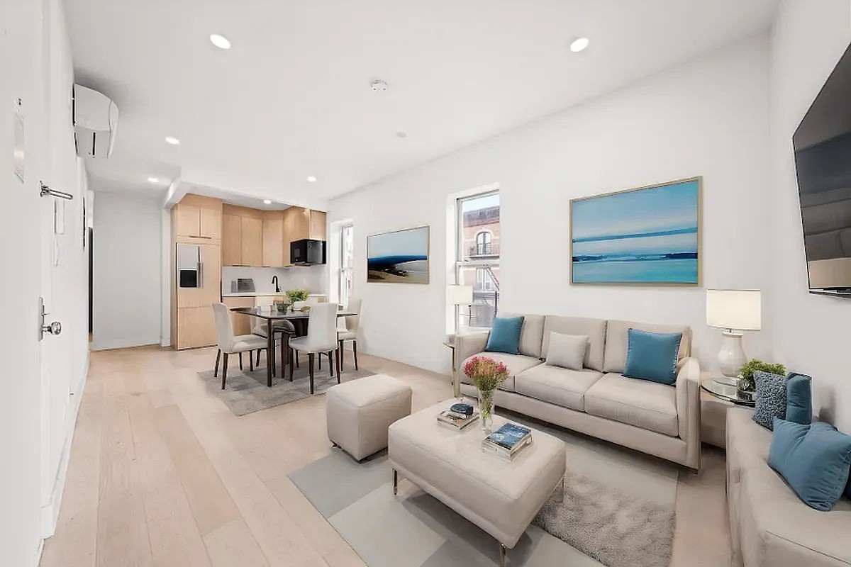 a living room with furniture and a table