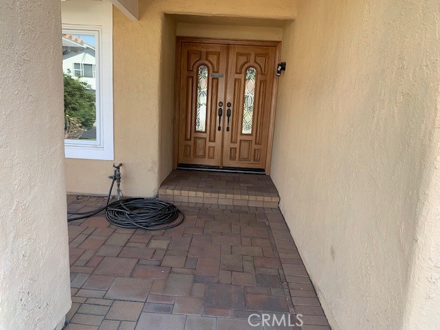 a view of a entryway door of a house