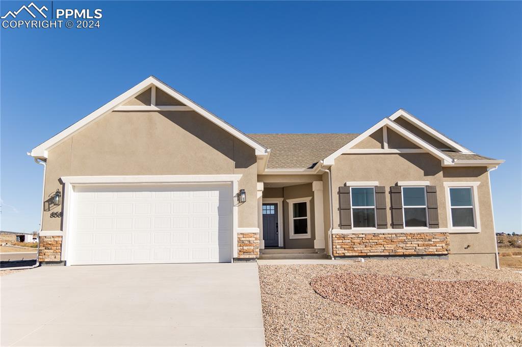 a front view of a house with yard