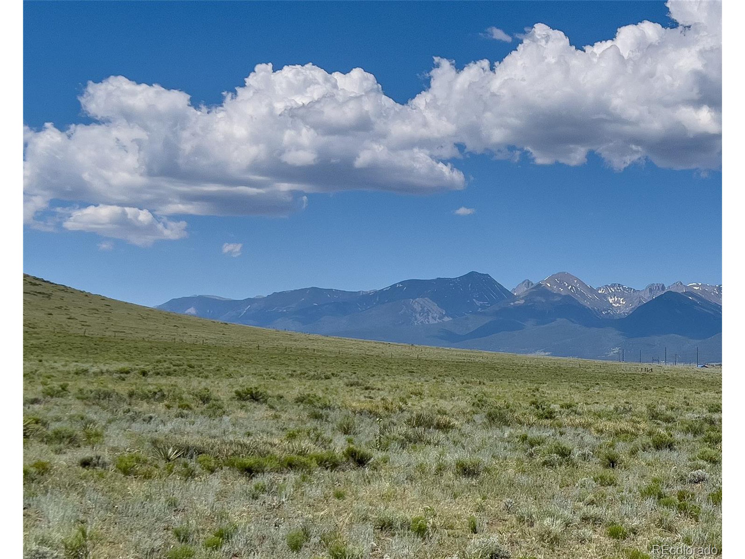 a view of an outdoor space and mountain view