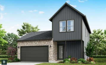 a front view of a house with a garage