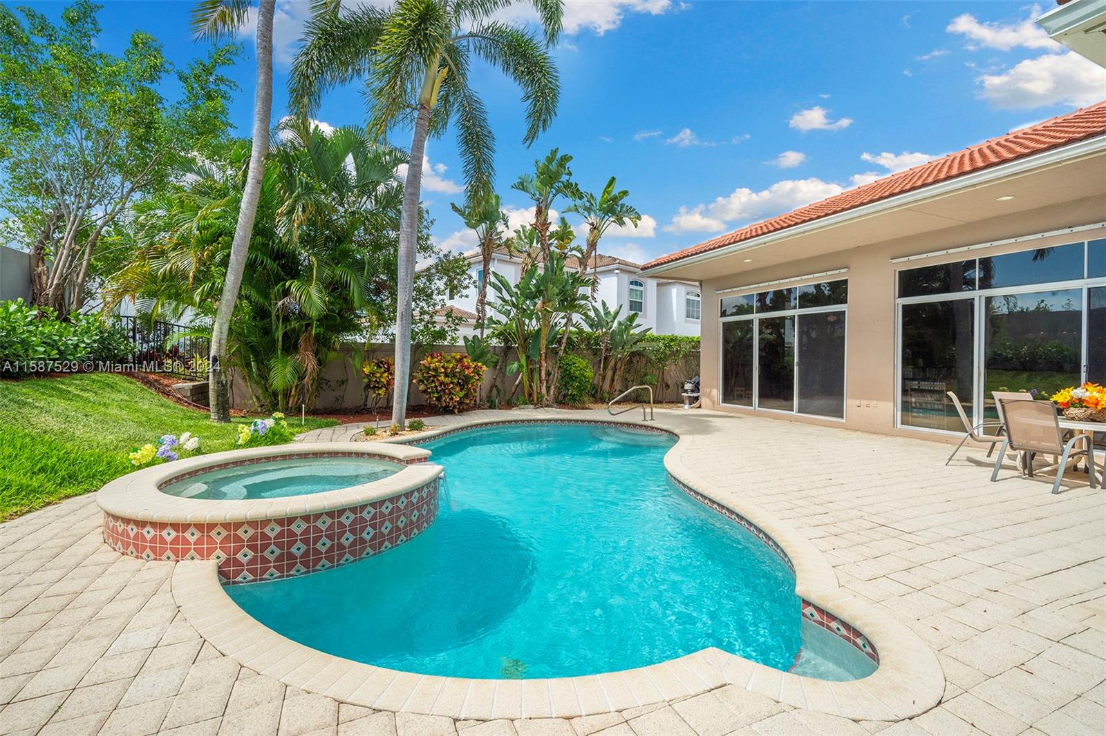 a view of a house with backyard porch and patio