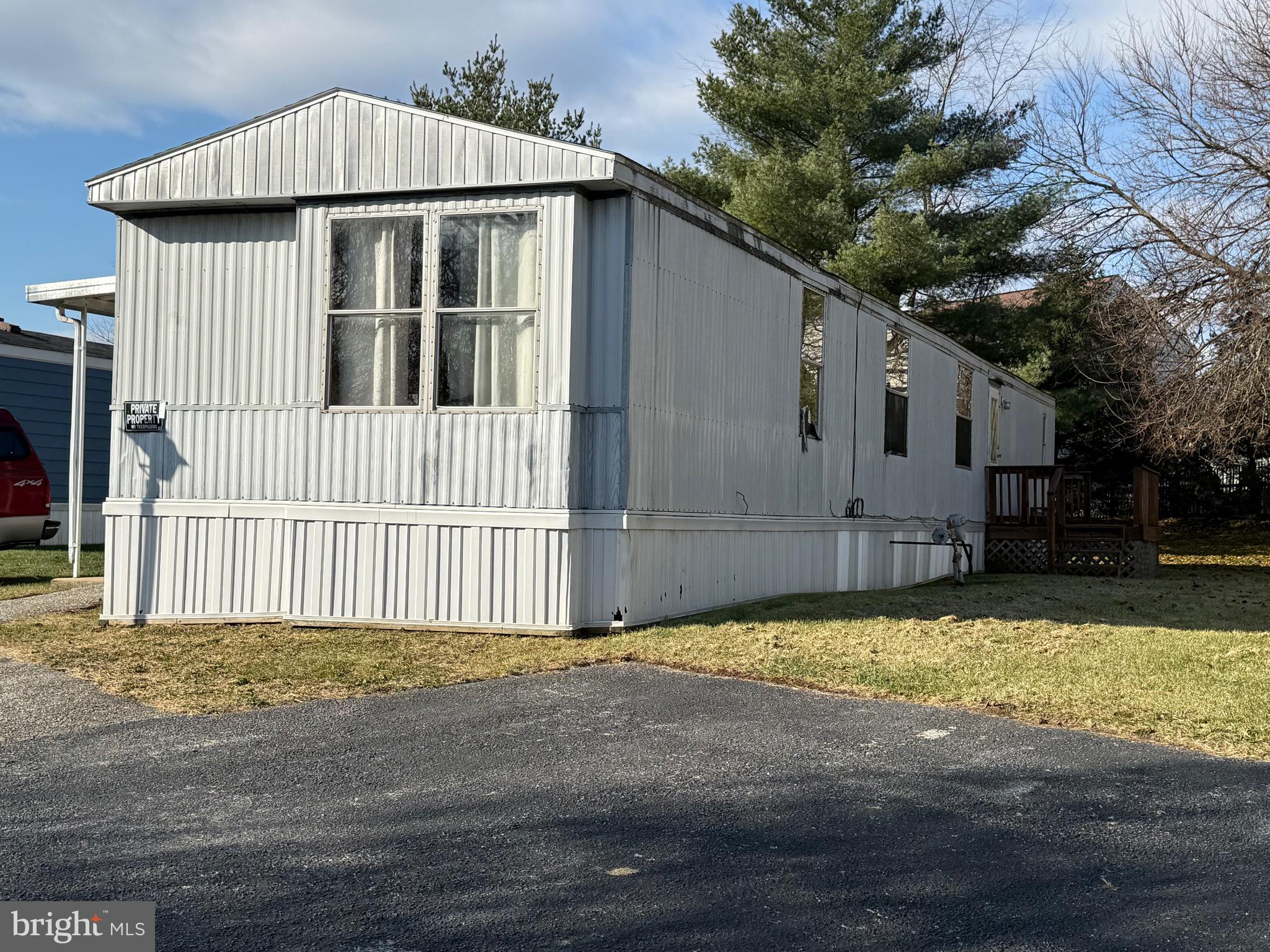 a house with trees in the background