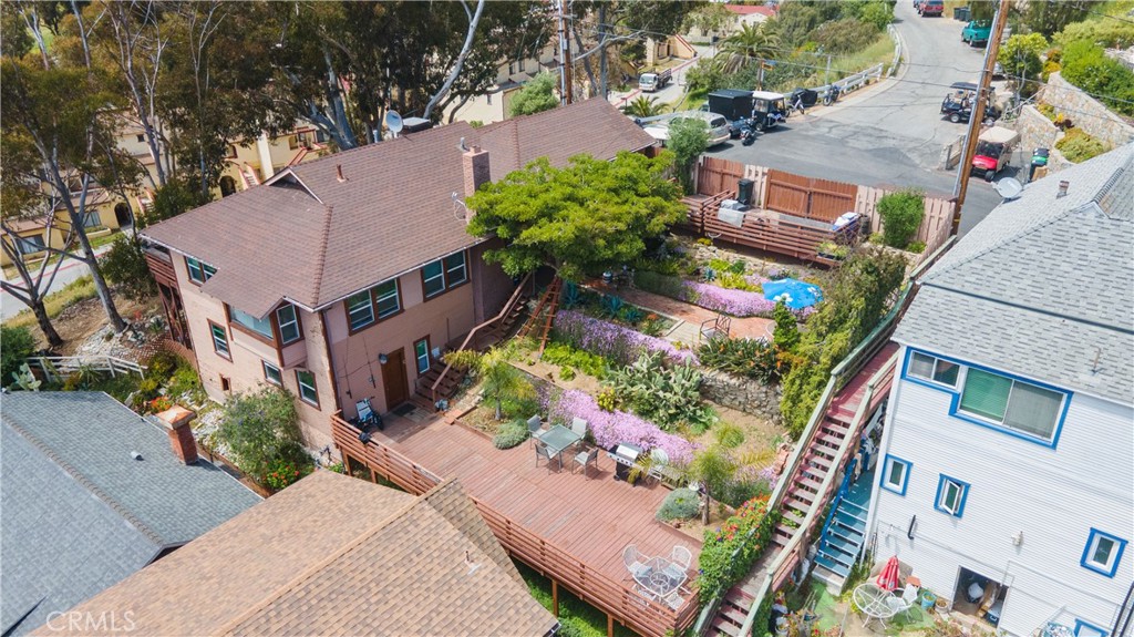 an aerial view of house with yard