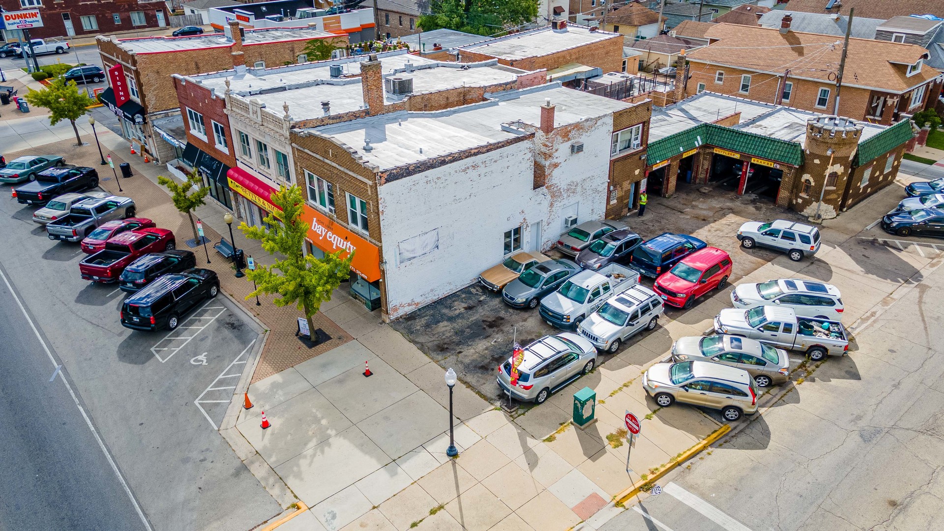 an aerial view of multi story residential apartment building