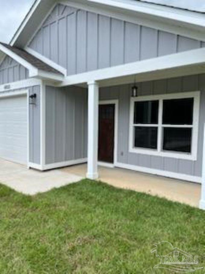 a house with yard in front of it