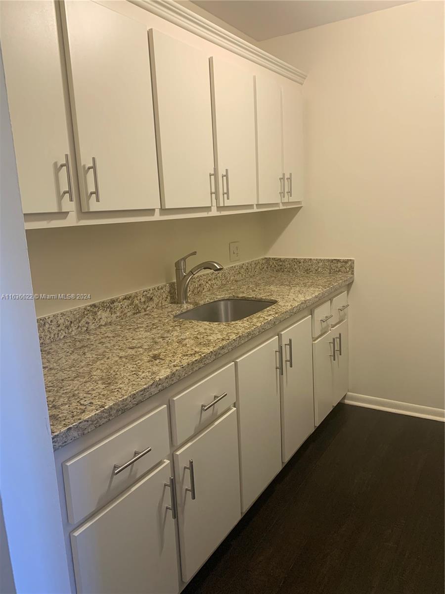 a view of cabinets and sink