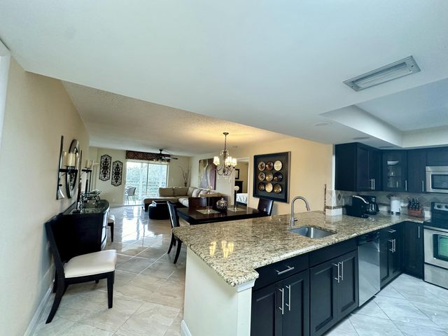 $269,999 | 299 Northwest 52nd Terrace, Unit 422 | Boca Teeca