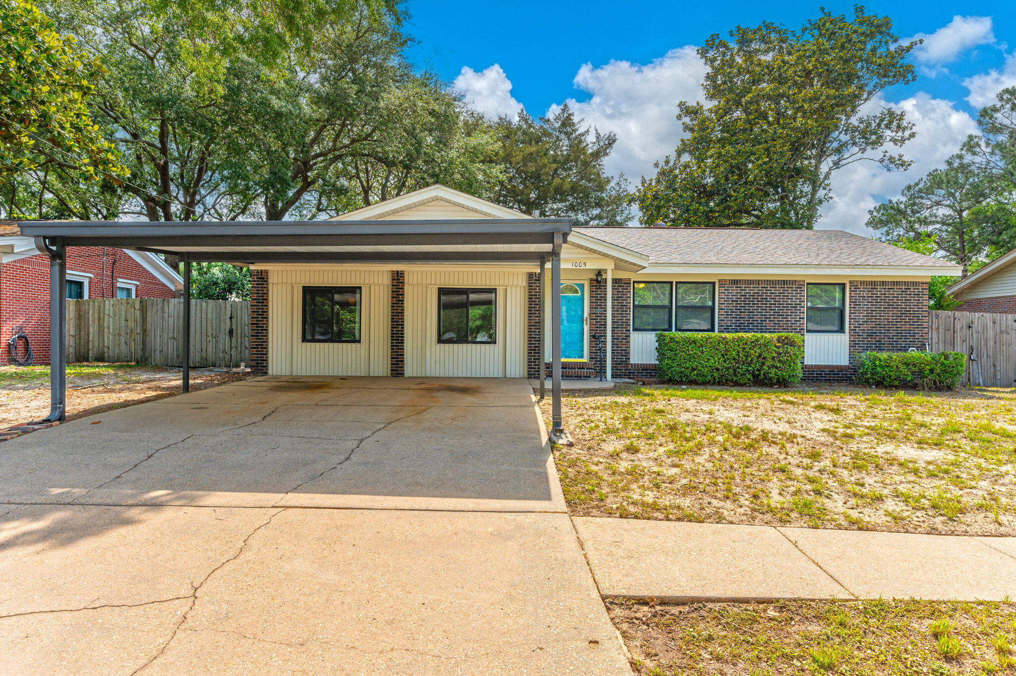 front view of a house with a yard