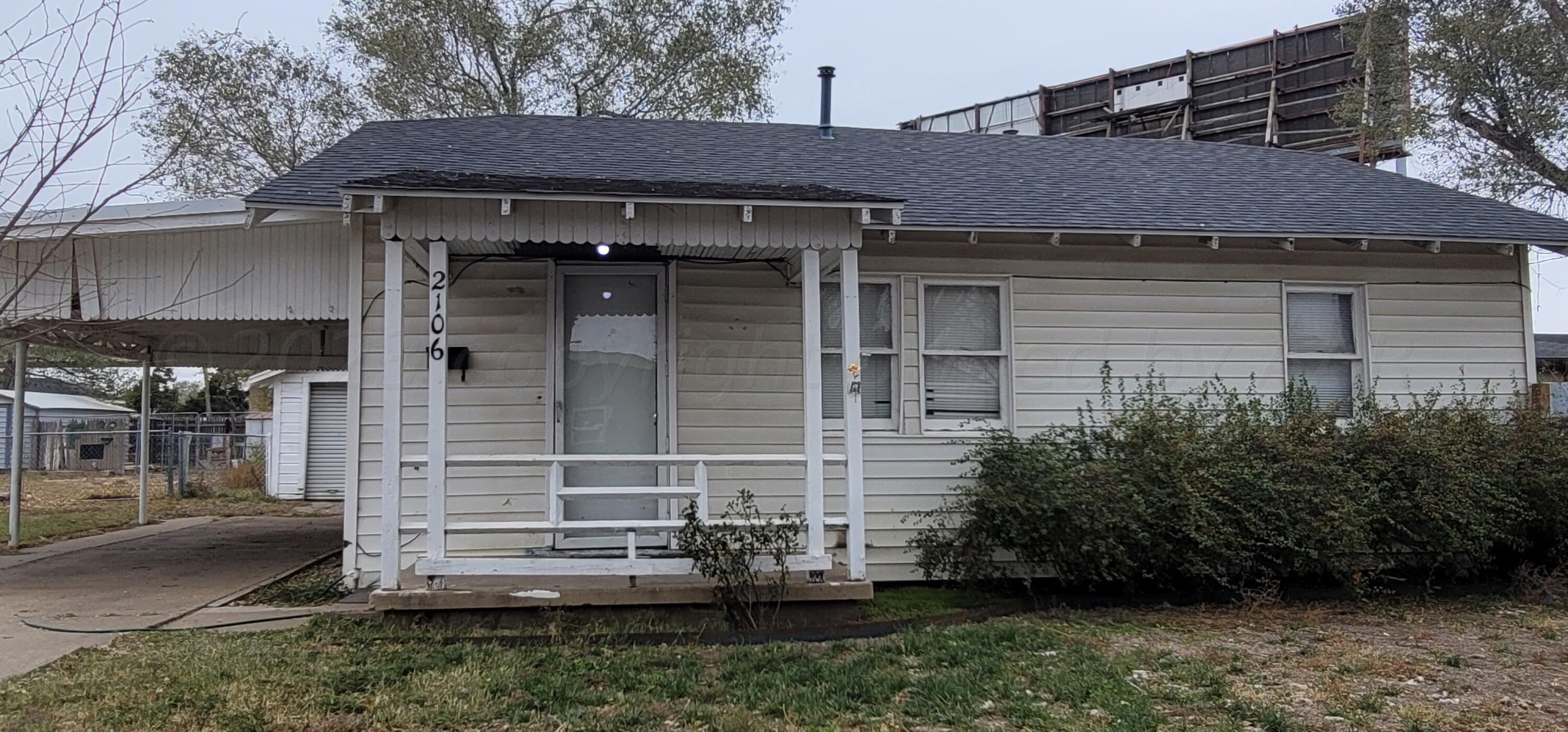 a view of house with outdoor space