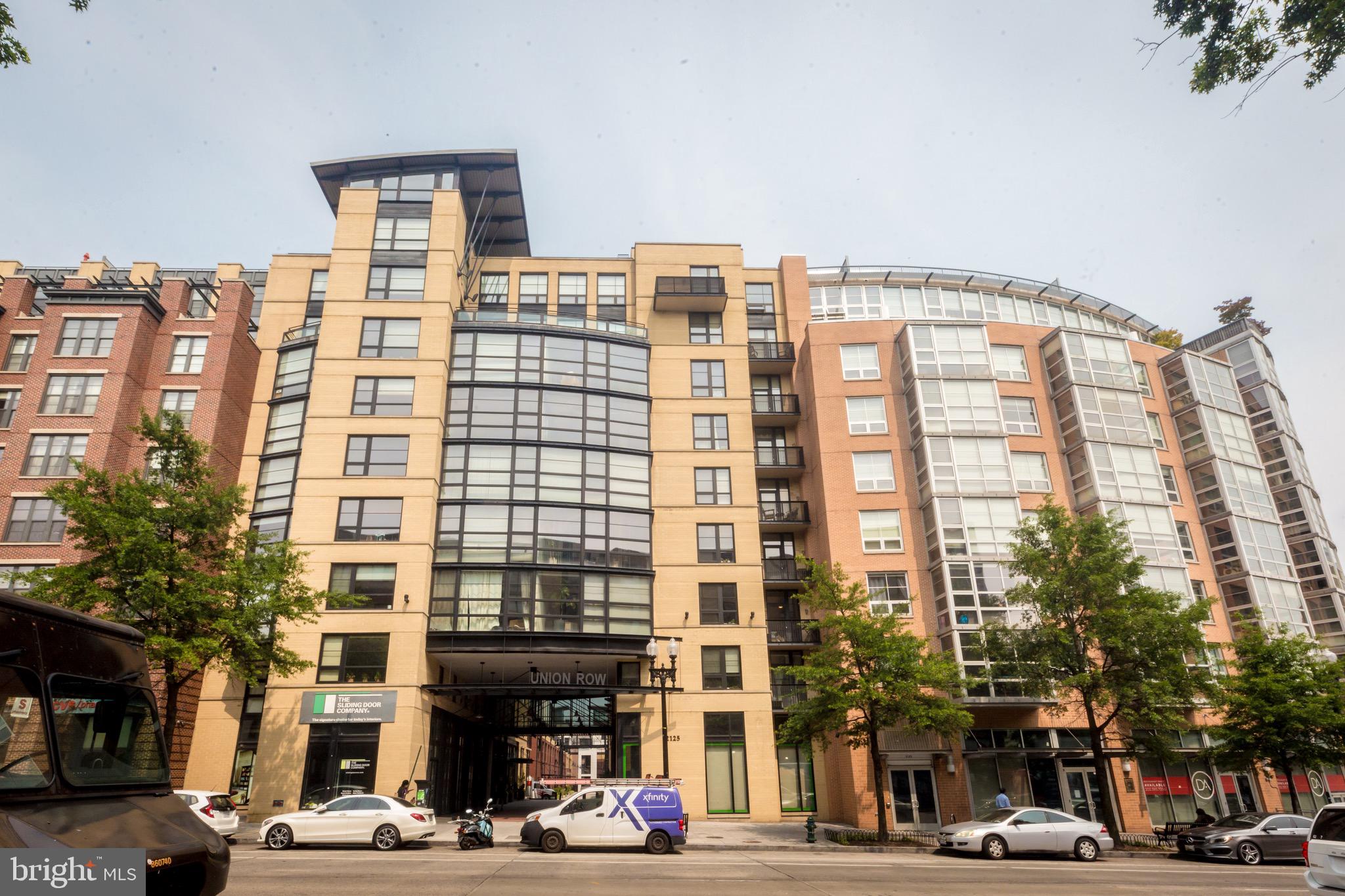 a front view of a building with street view